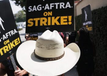 Striking actors and writers ‘trying to make a living’ brace for a long summer on the picket lines in their standoff with studios