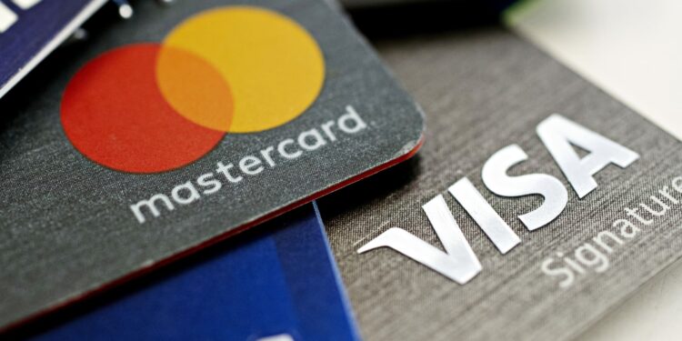 The fight over a bill targeting credit card fees pits payment companies against retailers The fight over a bill targeting credit card fees pits payment companies against retailers