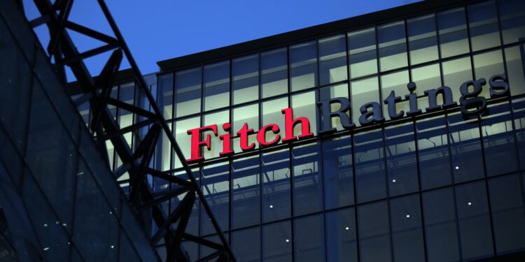 Fitch warns it may be forced to downgrade dozens of banks, including JPMorgan Chase