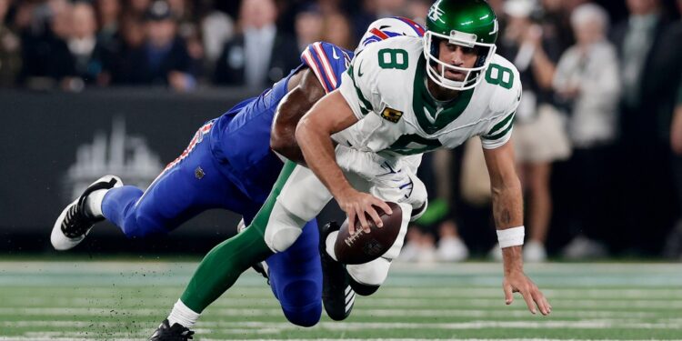 Aaron Rodgers’ season—and career—might be over because of an injury on artificial turf. A sports injury expert breaks down why grass could have been safer