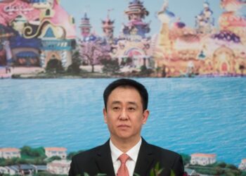 Evergrande spirals even further after halting its shares and admitting its billionaire chairman is detained due to ‘suspicion of illegal crimes’
