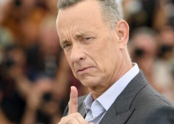Tom Hanks, a longtime critic of using AI in film and TV, warns fans about a dental plan video using a deepfake AI version of him: ‘We saw this coming’