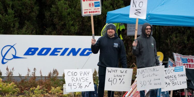 Boeing union backs sweetened contract offer that could end strike, sets vote for Monday