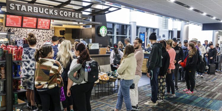 Can Starbucks fix long lines at its airport cafes?