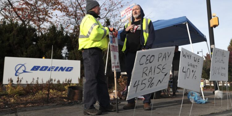 Striking Boeing machinists vote on union-backed contract proposal, this time with a warning