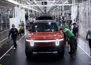 Rivian cuts 2025 delivery target, ups expected spending amid tariff pressures Rivian cuts 2025 delivery target, ups expected spending amid tariff pressures