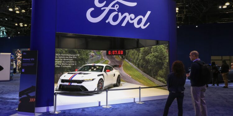 Ford reinstates full-year outlook, including  billion tariff hit Ford reinstates full-year outlook, including  billion tariff hit