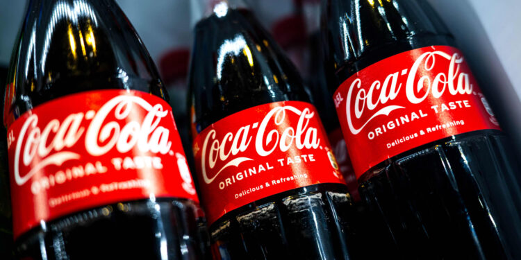Coca-Cola tops earnings and revenue estimates but says demand for drinks is still soft